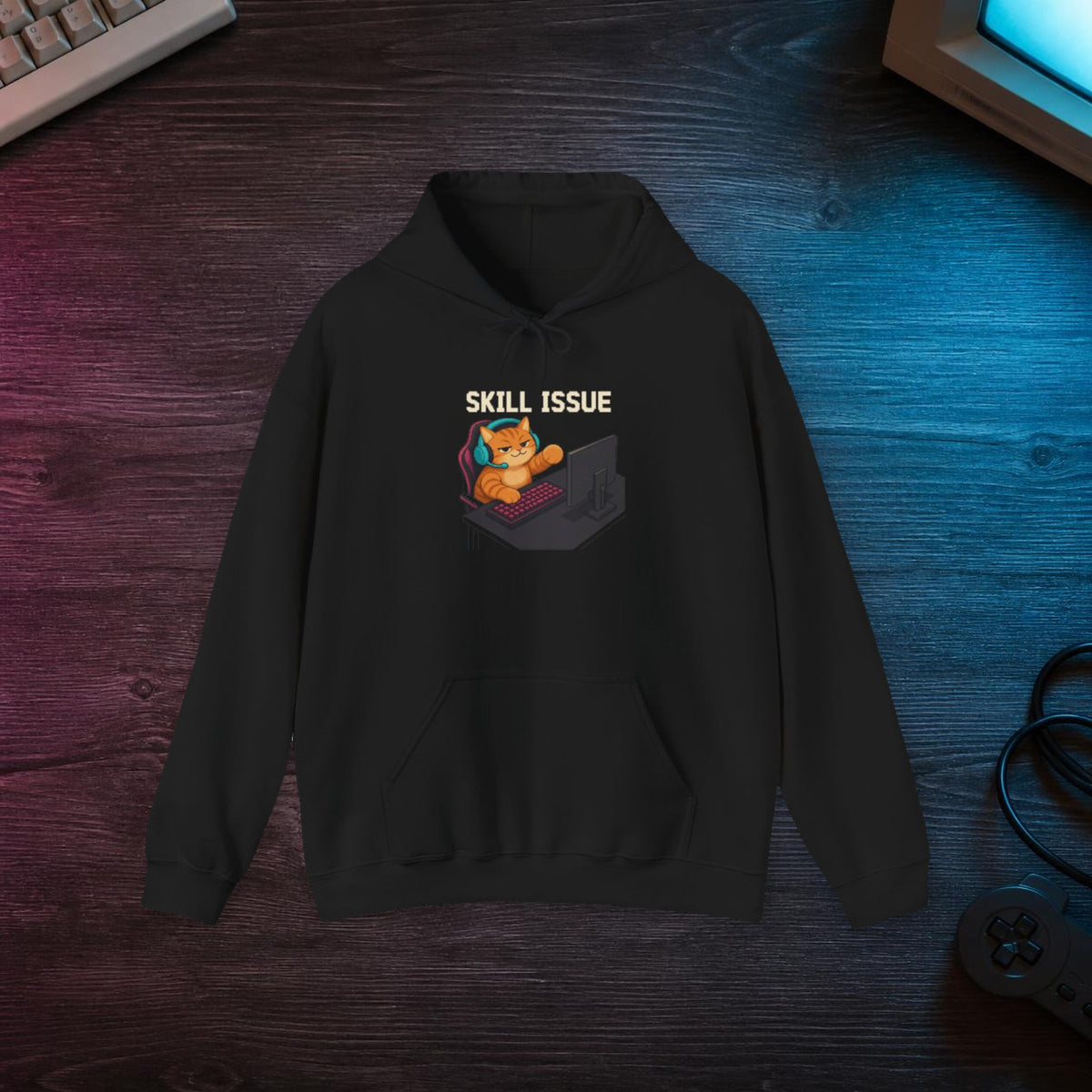 Skill Issue Gaming Cat Fleece Hoodie — Wear8bit — faithful supplier-product retro gaming room scene; digital mockup [Wear8bit gaming cat v1]