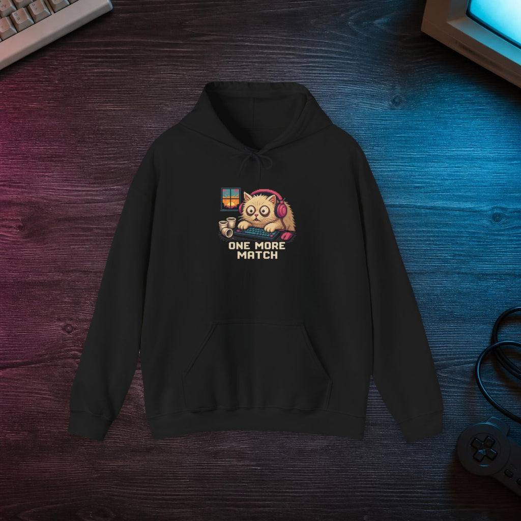 One More Match Gaming Cat Fleece Hoodie — Wear8bit — faithful supplier-product retro gaming room scene; digital mockup [Wear8bit gaming cat v1]